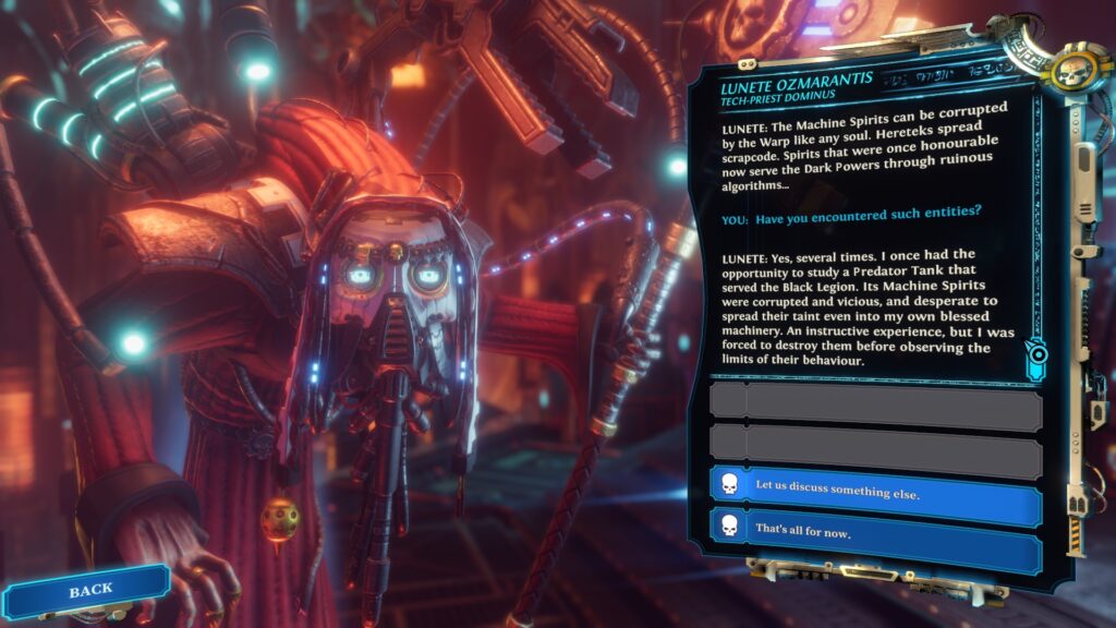 Warhammer 40000: Chaos Gate - Daemonhunters screenshot: a close-up of the torso of the Techpriest Domina Lunete on the left and a dialogue column on the right. 