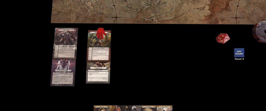 Tabletop screenshot of the Malediction module: four cards on table in two pairs of overlaying cards. They're red and with art suggestive of barbarians.